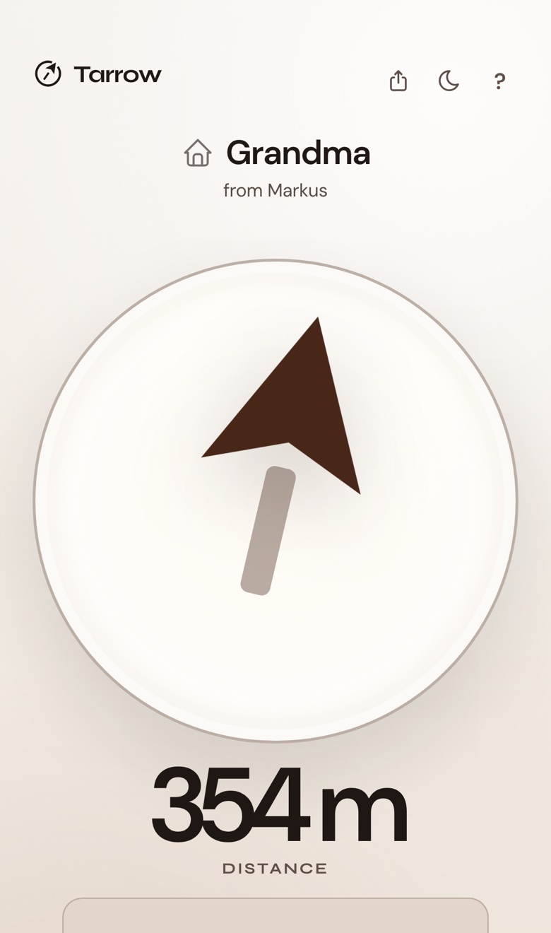 The arrow page on a phone: a large arrow and 354 m to Grandma